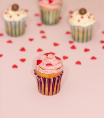 Cupcakes desert cream pink and white on pink background