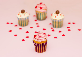 Cupcakes desert cream pink and white on pink background