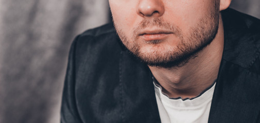 Fototapeta premium Close portrait of man with gray backgroud