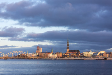 Fototapeta premium Riga, Latvia – Sunrise panorama of the town center from the Daugava river embankment - (November 21, 2015)