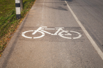 Obraz premium Cycle Lane with Cyclist in Mae Fah Luang University, Chiang-Rai Thailand