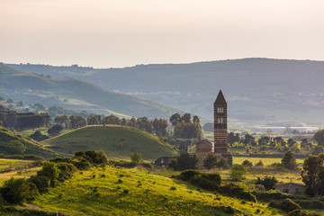 Sunset view of basilica della Santissima Trinita di Saccargia (Basilica of the Holy Trinity of...