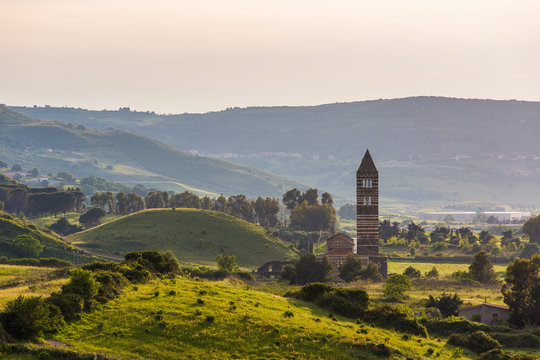 Sunset view of basilica della Santissima Trinita di Saccargia (Basilica of the Holy Trinity of Saccargia) - Codrongianos, Sardinia (Sardegna), Italy (May 6, 2014)