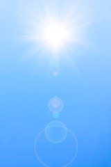 Shining sun at clear blue sky.