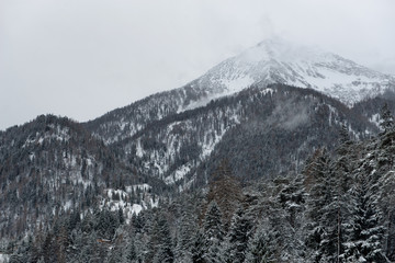 Overcast sky over mountain peak