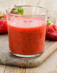 glass of fresh strawberry milkshake