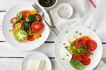 italian caprese salad and tomato on plate