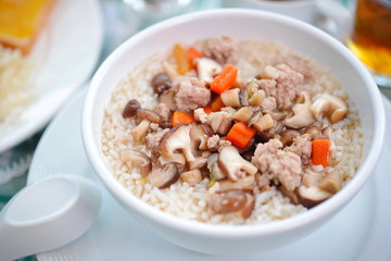 Boiled rice pork or mush for breakfast.