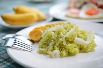 shredded rice grain with Coconut Flesh and Banana thaifood
