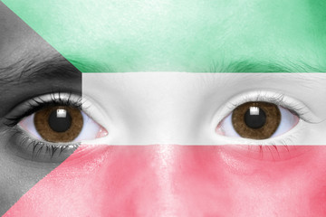 human's face with kuwait flag