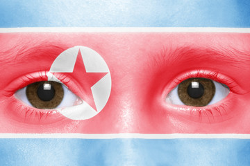 human's face with north korea flag