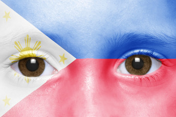 human's face with philippines flag