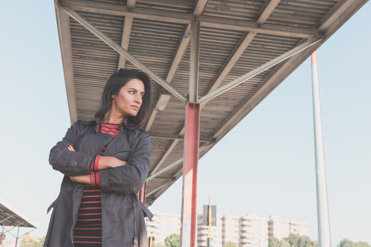 Beautiful girl posing in an urban context