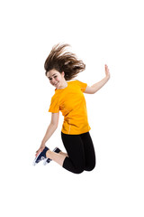 Young woman jumping on white background 