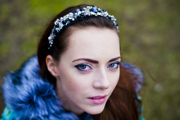 Portrait of a beautiful woman in a diadem of hair