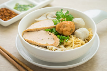 Noodles with fish balls in bowl