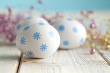 Easter eggs on wooden background