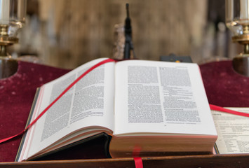Open Bible with red book marker
