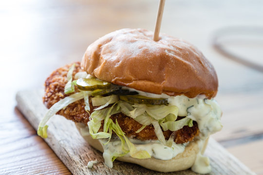 Fried Fish Sandwich On Wood Board