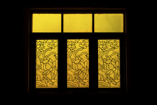 Silhouette of old glass window.