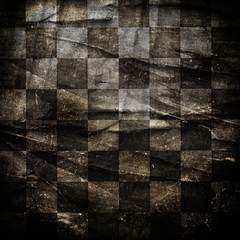Grungy chessboard background with stains