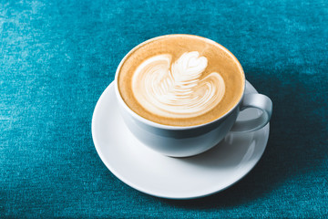 Cup of latte with pattern