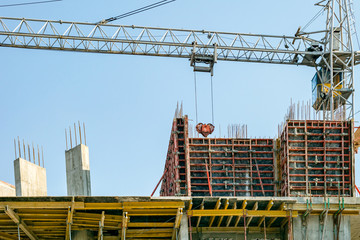 Building under construction and crane.