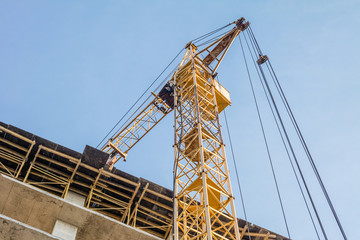 Fototapeta na wymiar Building under construction and crane.