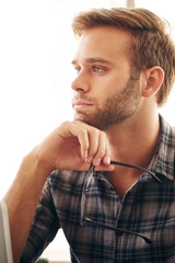 Obraz premium Close up image of young adult businessman