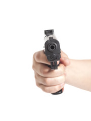 Hand with gun isolated