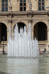 Paris -  Architectural fragments of Louvre building. Louvre Museum is one of the largest and most...
