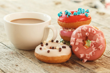 Cup of coffe and donuts