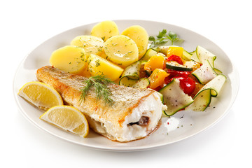 Fish dish - fried fish fillet and vegetables 