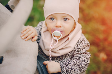 young family walking in the park