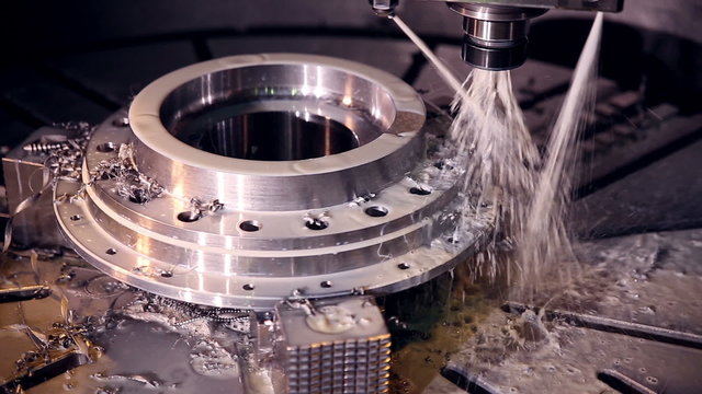 Modern CNC Machine operates with metall.