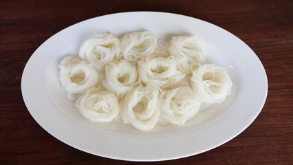 Fermented Rice Flour Noodles. vermicelli on wood table background