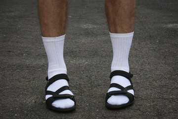 Men's feet in sandals