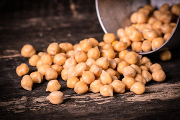 chickpeas on rustic background, healthy food concept