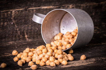chickpeas on rustic background, healthy food concept