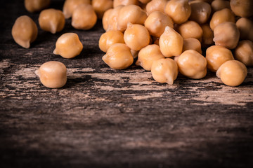 chickpeas on rustic background, healthy food concept
