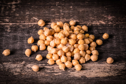 chickpeas on rustic background, healthy food concept