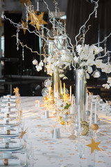 Festive table decorated with candles
