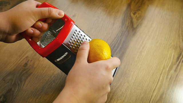 Lemon zest being grated, slow motion