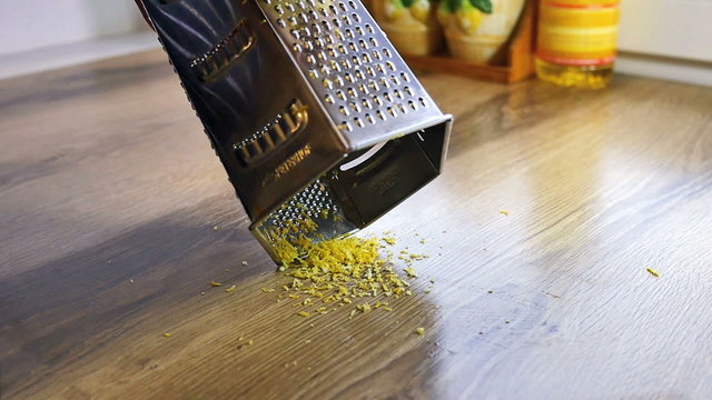 Lemon zest being grated, slow motion