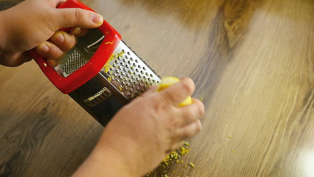 Lemon zest being grated, slow motion