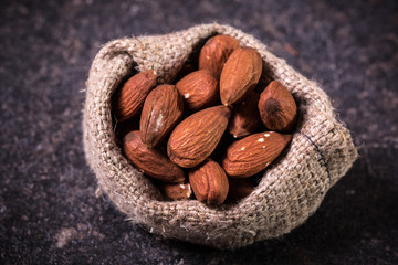 Mix nuts on wooden table,healthy vegan food.