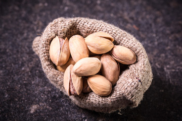 Mix nuts on wooden table,healthy vegan food.
