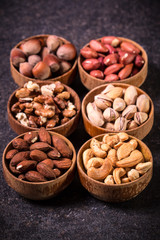 Mix nuts on wooden table,healthy vegan food.