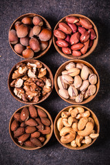 Mix nuts on wooden table,healthy vegan food.