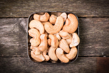 Mix nuts on wooden table,healthy vegan food.